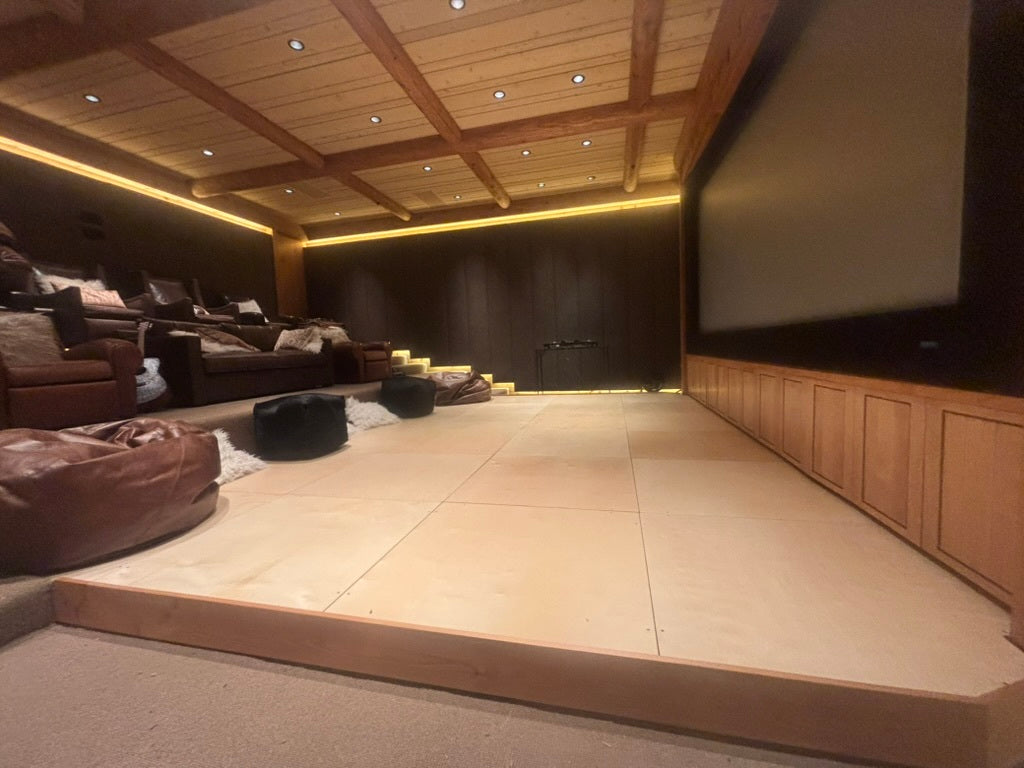 A permanent installation of Crescendo Bass Tiles in a large home theater.